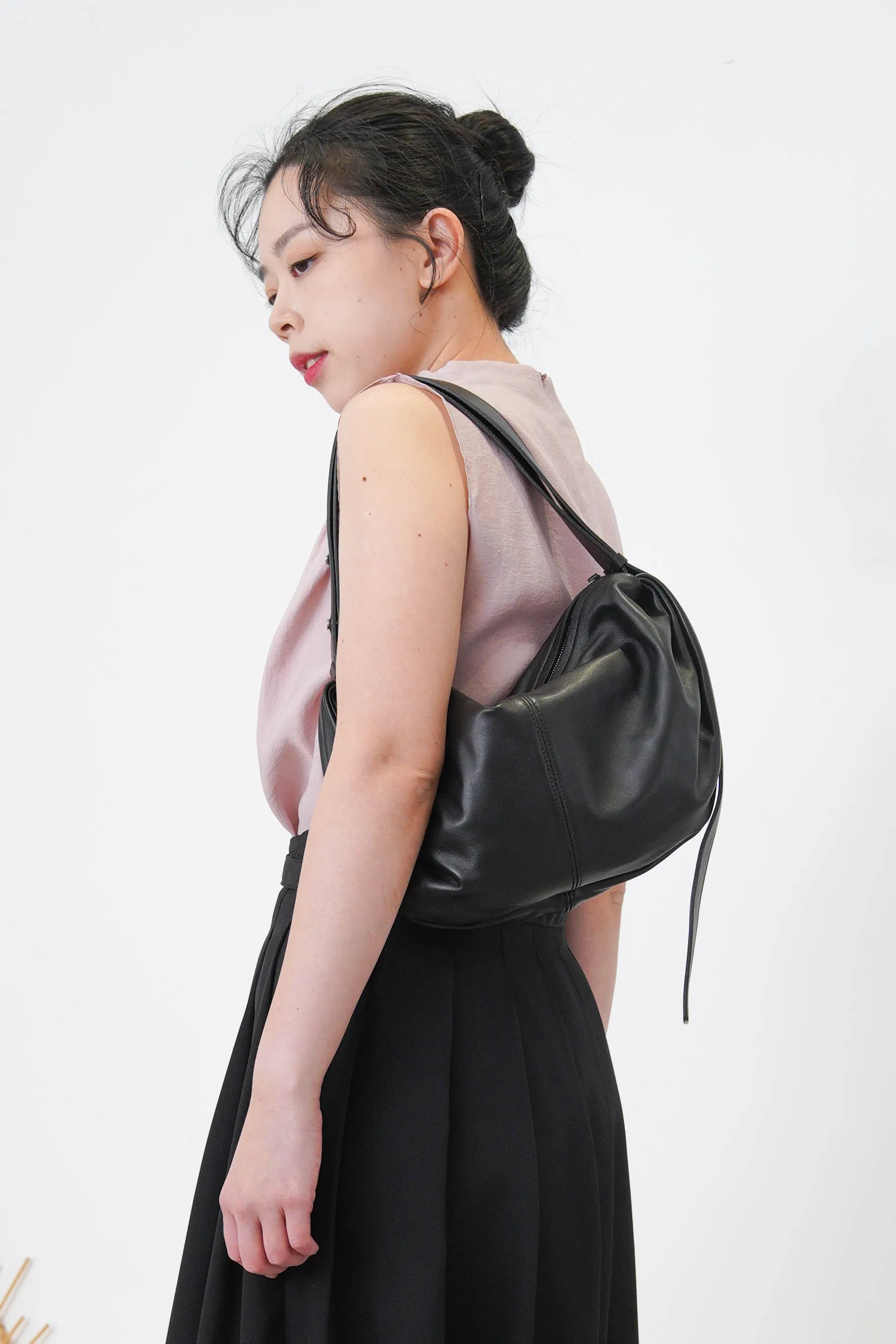 Pink high neck blouse in pleats shoulders