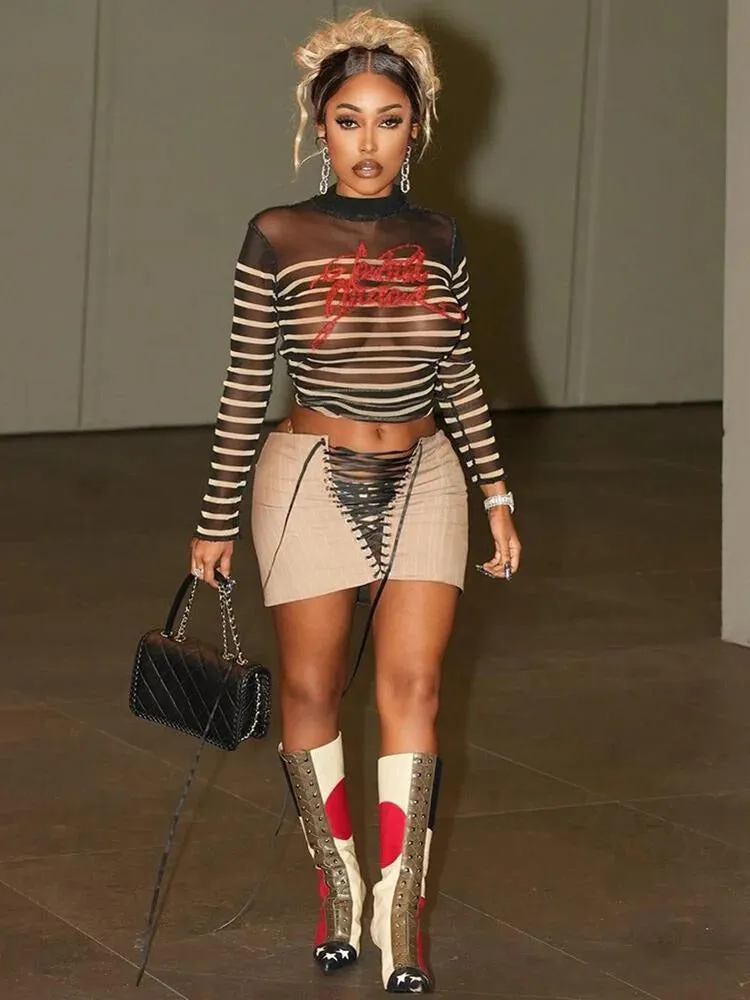 "Get Noticed in the Trendy and Wild T-BOO Women's Crop Top - Featuring Sexy Mesh, Bold Prints, and Striking Stripes - Shop Now for the Ultimate Fashion Statement!"